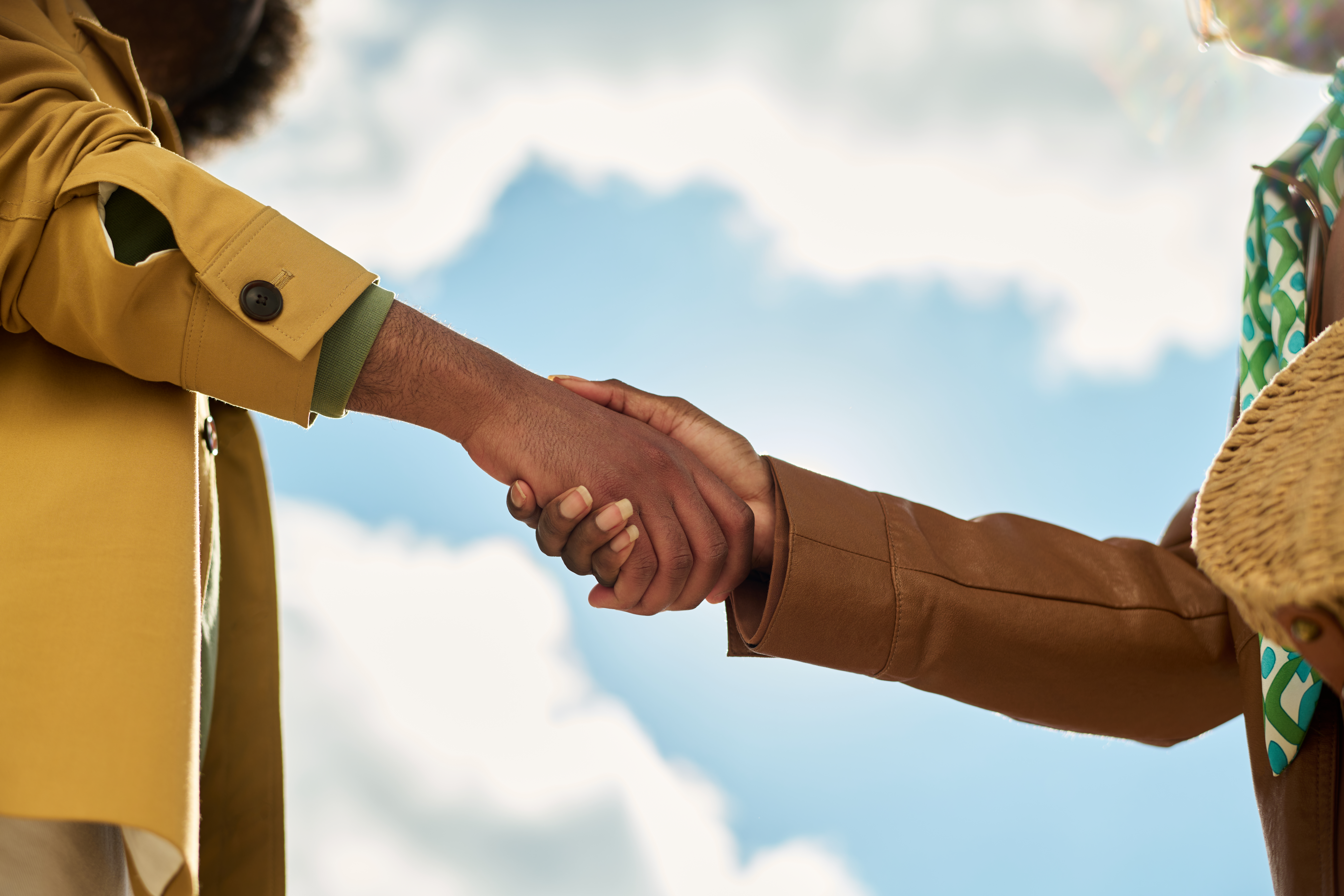 Handshake to start a collab between a charity and a for-profit brand